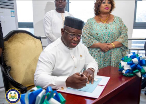 Image of H.E. Dr Julius Maada Bio — President of Sierra Leone, signing the GEWE Act at State House. Image Source: State House Comms.